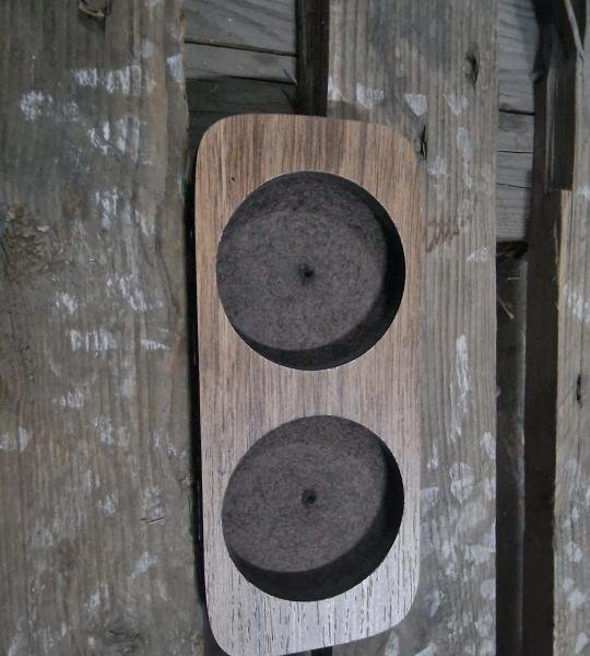 Mbajtes druri per shishe vaji